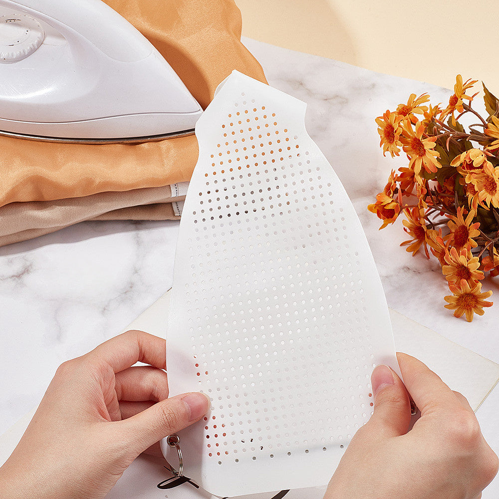 Get your hands on the 1pc SUPERDANT Non-Stick Plastic Ironing Aid - a reusable iron shoe protector that is heat-resistant and requires no power. This accessory is perfect for delicate fabrics and makes an ideal gift for Christmas and Thanksgiving.