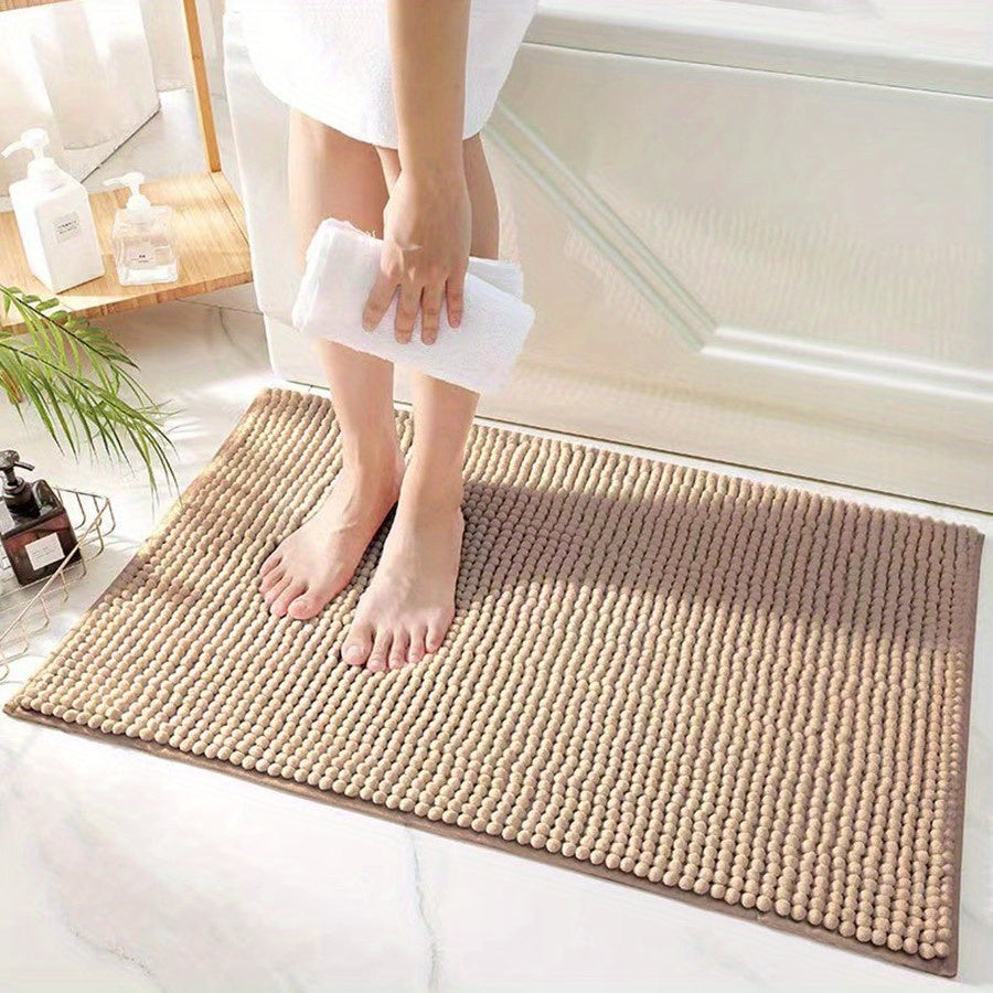 Get this luxurious Chenille Bath Mat, 2cm Thick, with a non-slip, super absorbent, quick-dry design. Made of woven polyester with rubber backing, this mat weighs 1450gsm and is perfect for the bathroom, kitchen, bedroom, or entryway. It also makes a