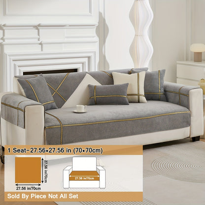 Elegant gray chenille sofa cover with golden braided trim. Non-slip, pet-friendly, and fits single to four-seater sofas. Perfect for all-season use as an elegant home decor in the living room.