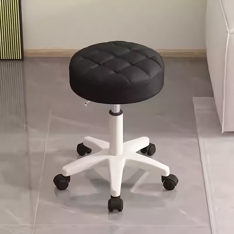 Black adjustable rolling stool with quilted plastic seat, height adjustment, perfect for salon professionals.