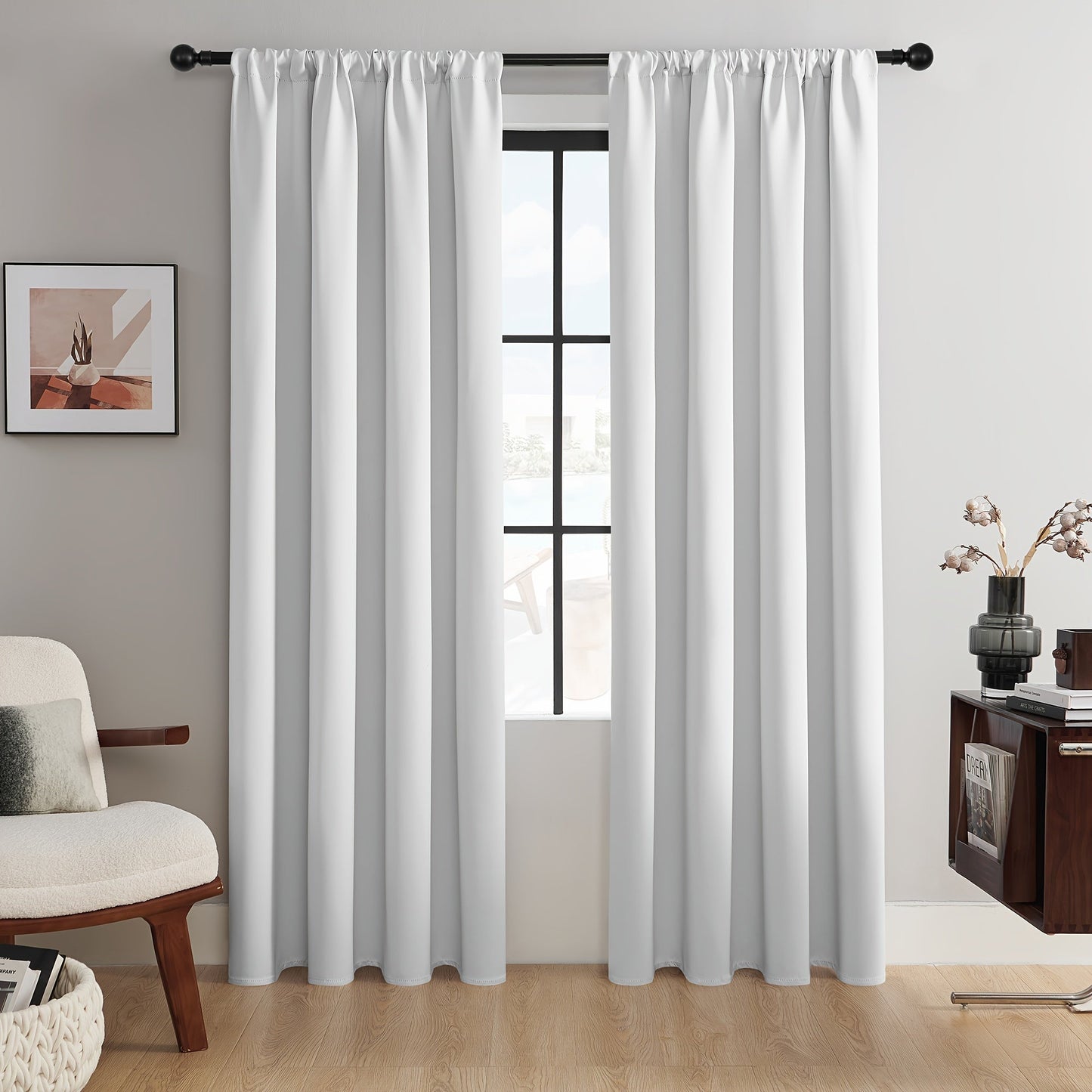 Add a touch of elegance to your living space with these 2 Panels Blackout Curtains. Perfect for both indoor and outdoor use, these curtains provide heat insulation and blackout capabilities. Made from a durable polyester blend, these simple and modern