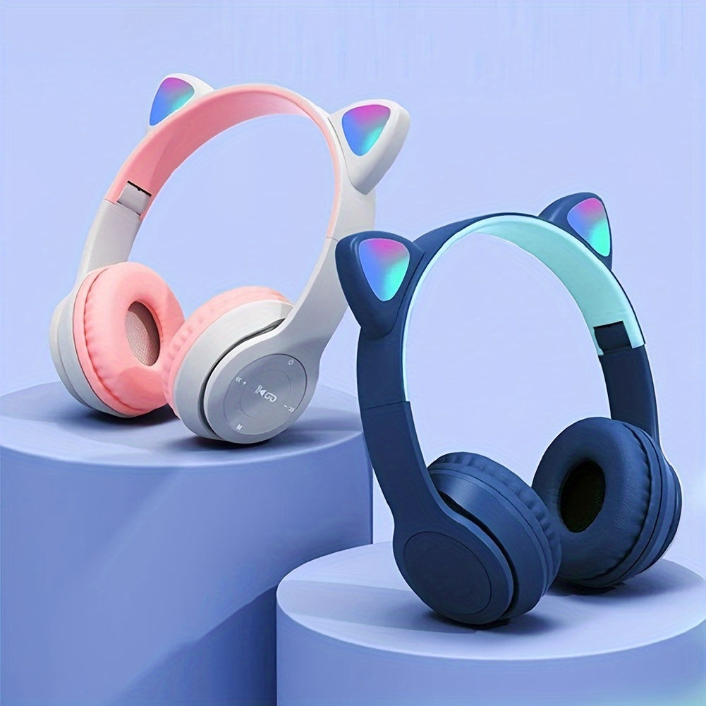 Wireless headphones with cute cat ears, LED lights, mic control. Stereo music helmet for phones and tablets with USB charging, volume control, and 3.5mm jack. Available in multiple colors.