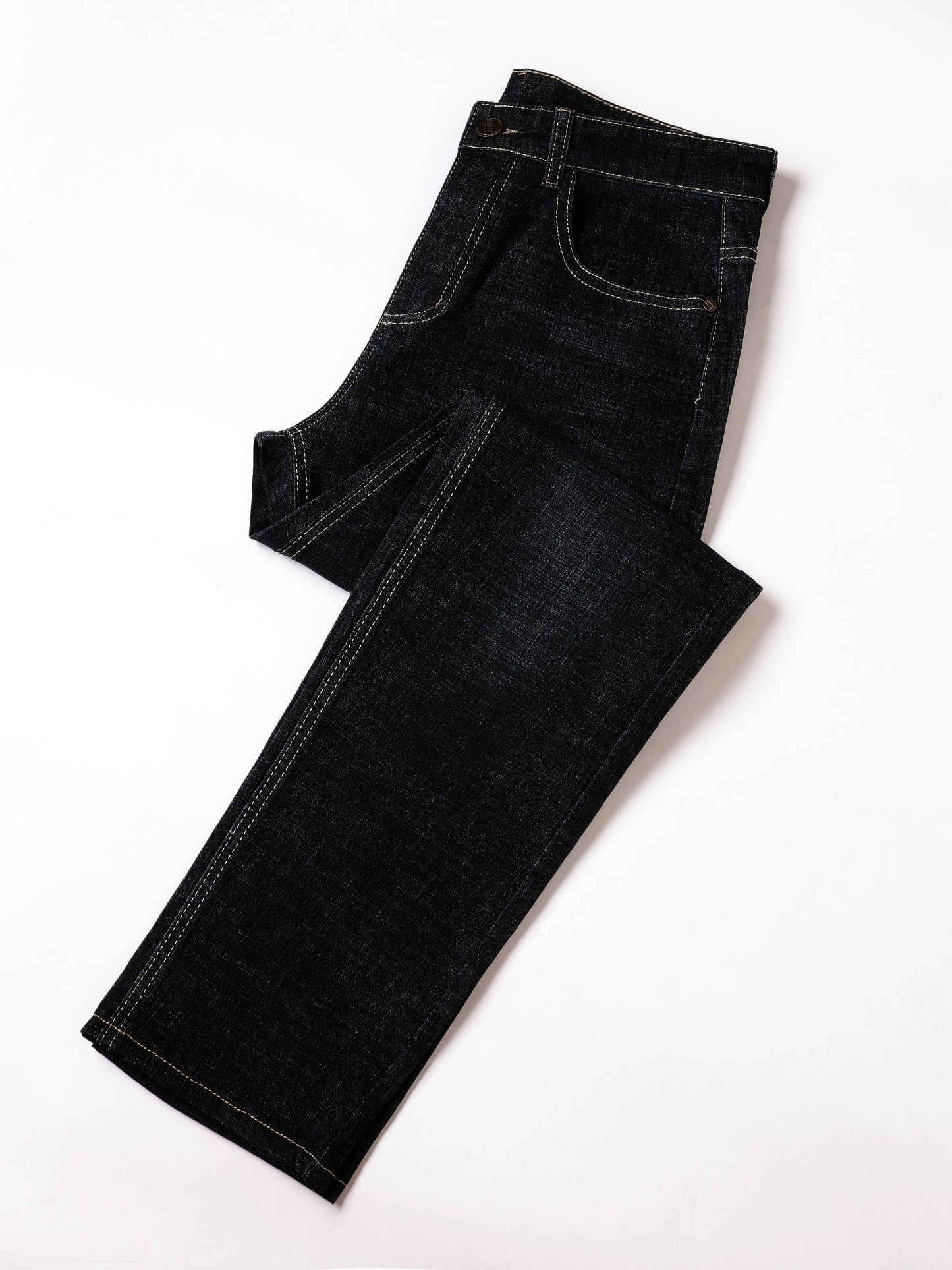 Men's solid denim trousers with pockets, casual cotton blend jeans for outdoor activities.