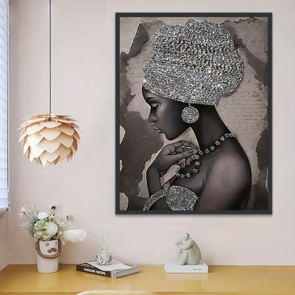 Abstract canvas painting featuring a silvery glitter embroidered African woman, ideal for home or office wall decor. Frame not included.