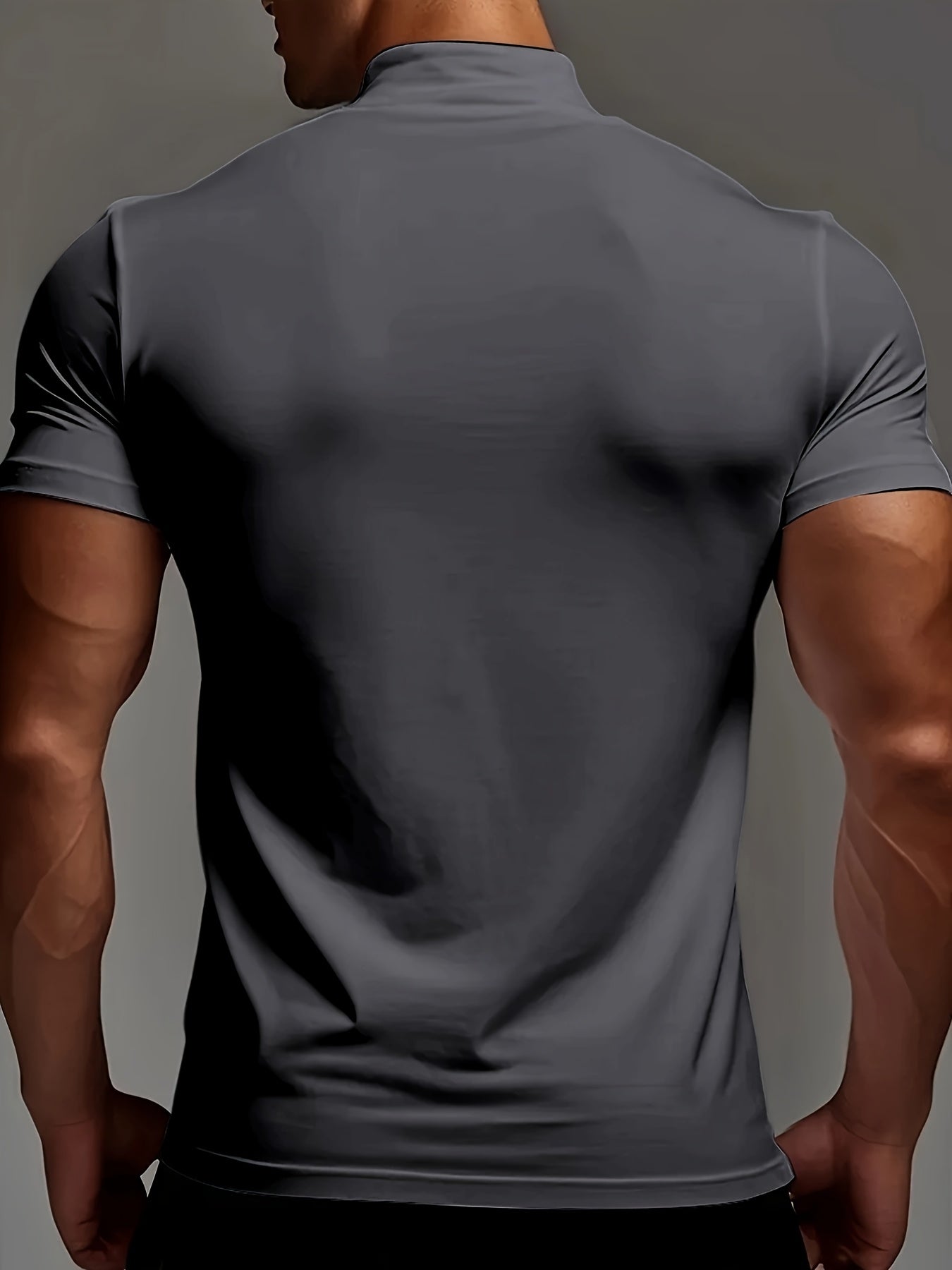 Men's slim fit short sleeve t-shirt with stand collar, ideal for gym and outdoor activities, made of breathable polyester-spandex blend, suitable for all-season wear.