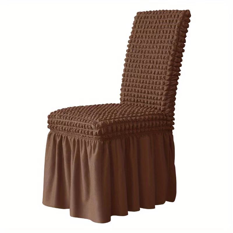 1 Seersucker dining chair slipcover with skirt, non-slip design. Protects furniture in various settings.