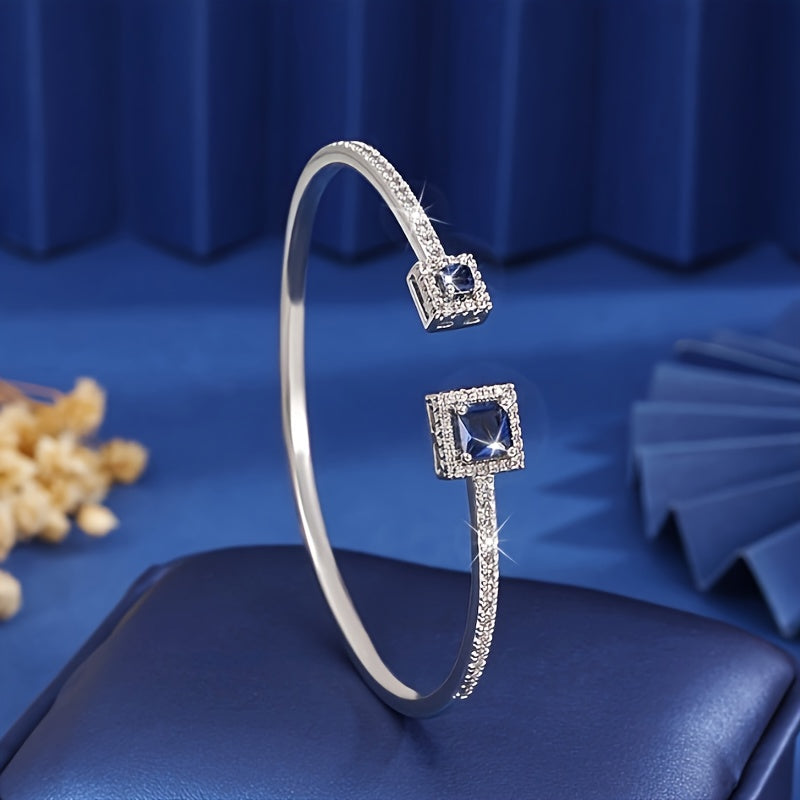 This elegant Boho style cuff bracelet is crafted in 925 silver with a square Moissanite gemstone. It is a fashionable and sparkling piece of jewelry perfect for women to wear daily or as a gift. Suitable for all seasons, it is ideal for the Spring