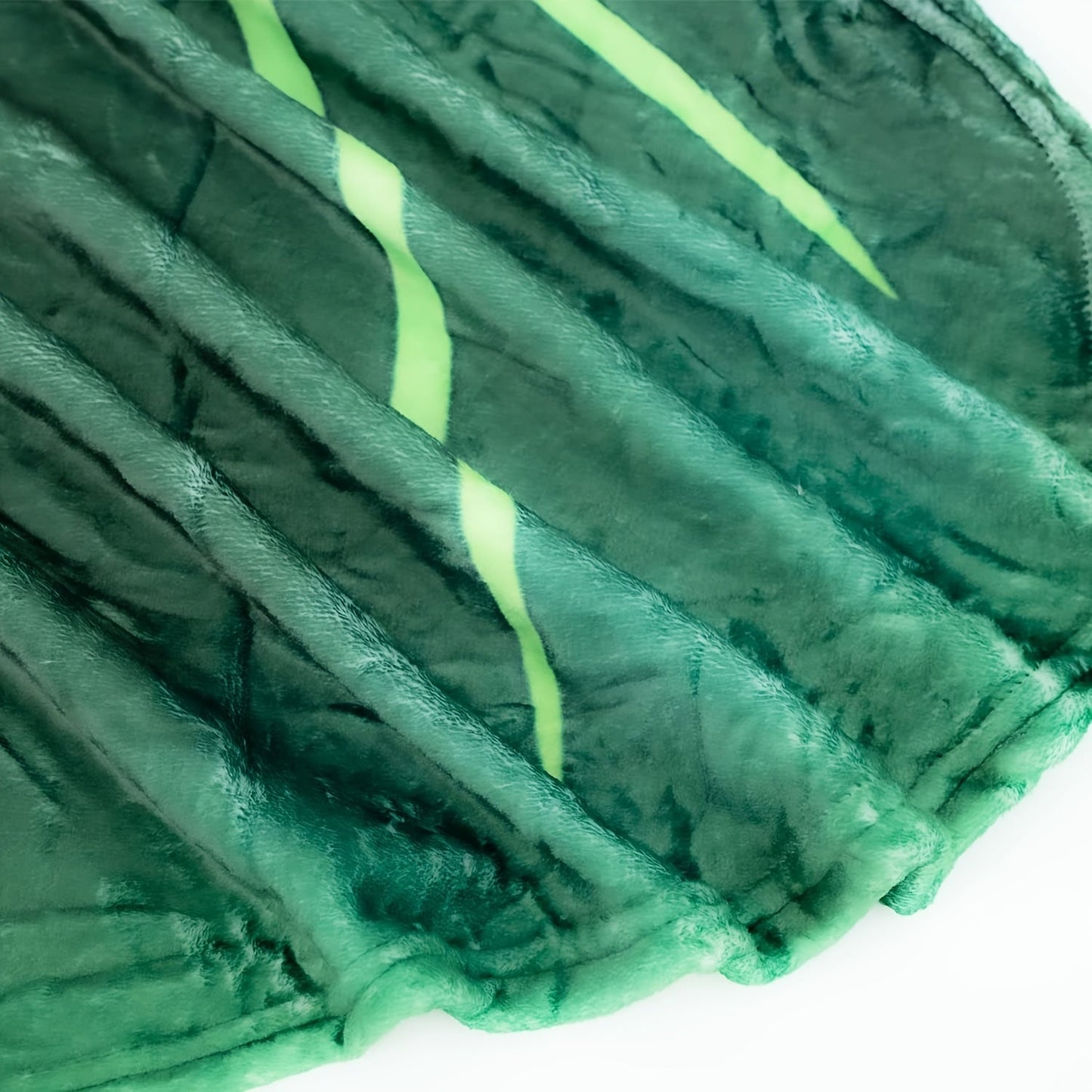 Green leaf-shaped blanket with warm and cozy feel - perfect for couch, bed, and sofa. Features high-definition digital printing.