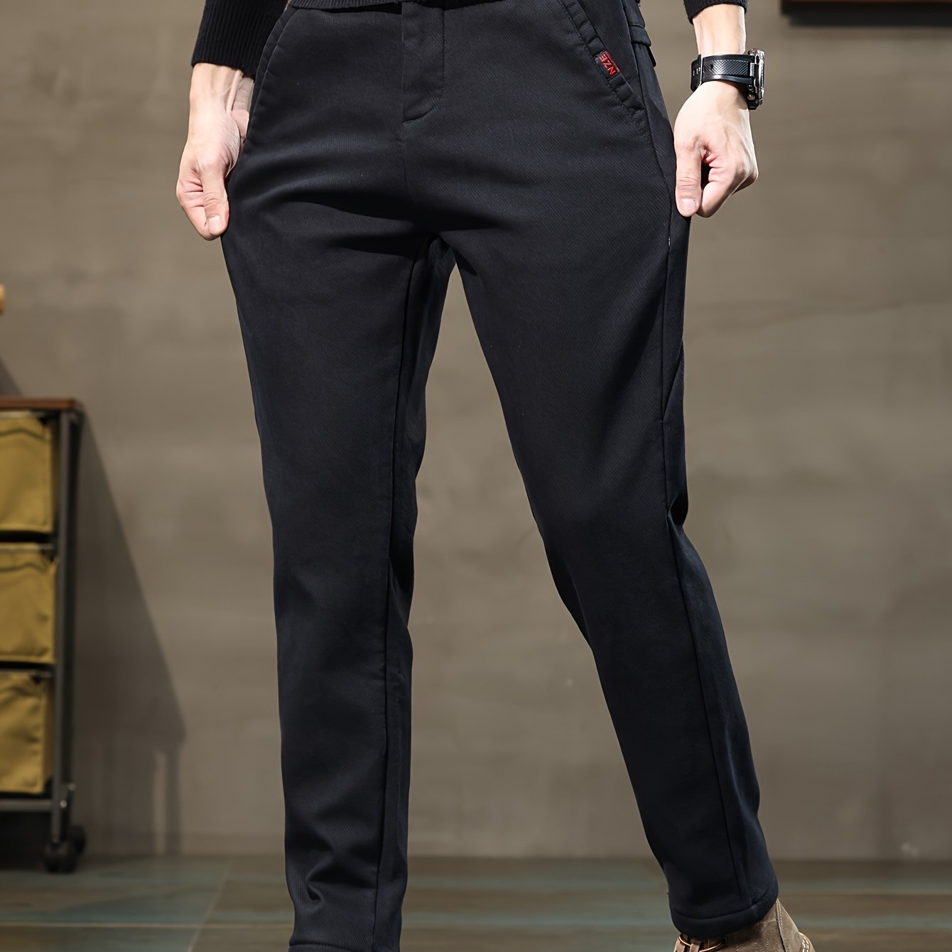 New men's casual pants by a sports brand, perfect for spring and autumn 2023.