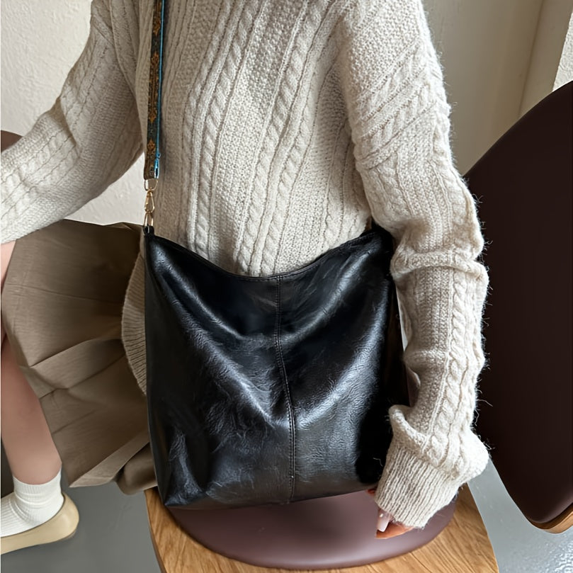 Chic shoulder bag with detachable totem strap; great for daily use or as a gift for anyone.