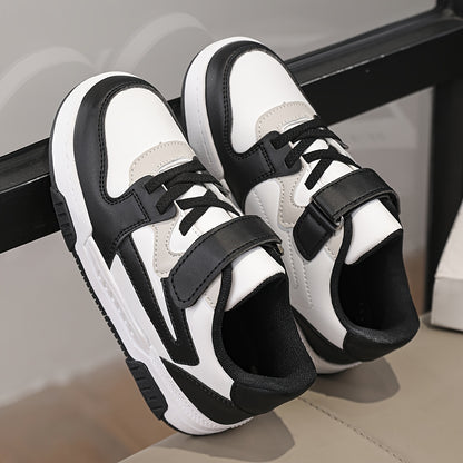 Boys' athletic sneakers in black, white, and grey with non-slip, breathable lining, hook-and-loop strap, and durable sole. Perfect for all seasons.