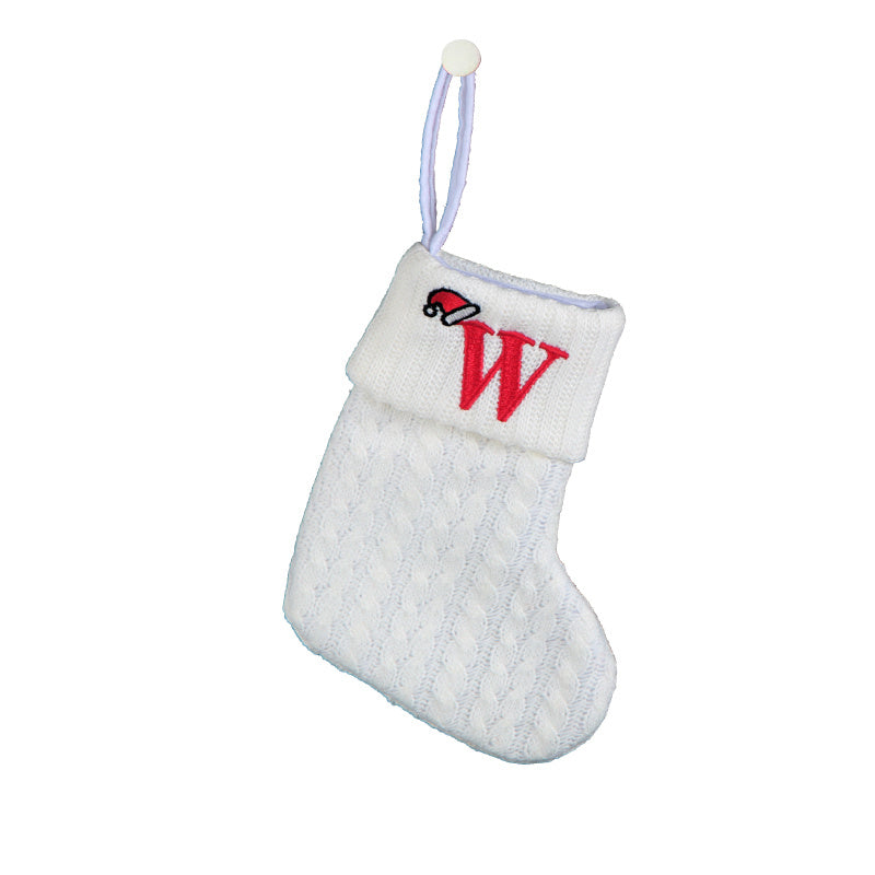 White cable knit stocking with embroidered 'F' - Ideal for indoor decor.