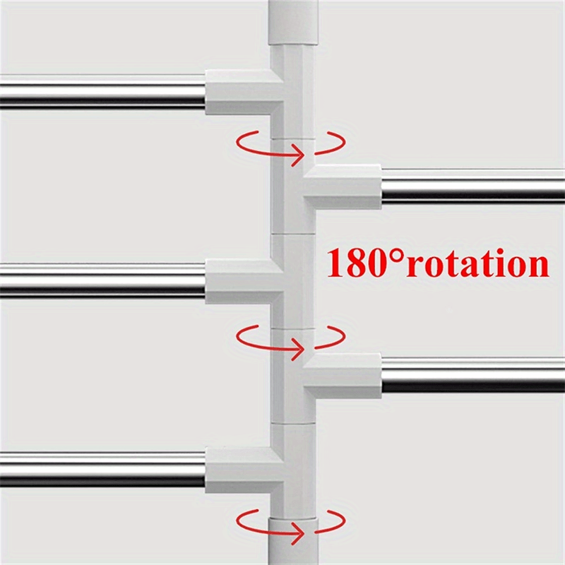 Modern wall-mounted towel rack with rotating hooks, stainless steel and plastic construction, suction cup shelf for toiletries and towels.