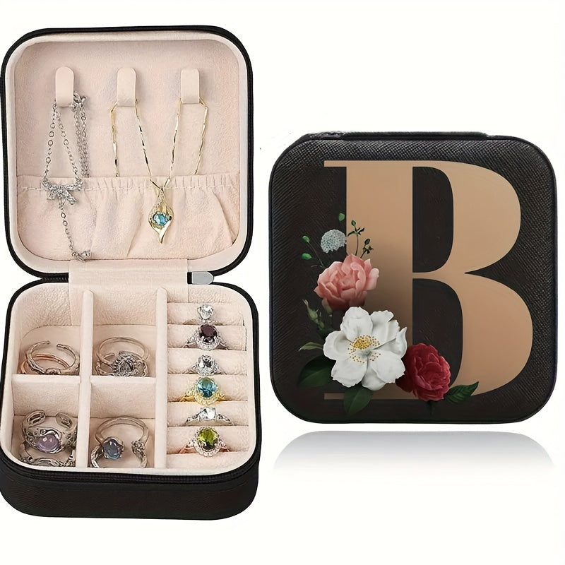 Floral initial jewelry organizer box with compact design, soft velvet lining, durable zipper, and lightweight, ideal for jewelry organization and travel.