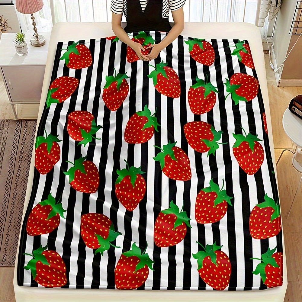 Black striped 1-piece Strawberry Printed Fleece Throw Blanket made from soft microfiber material with a durable twill weave. This all-season blanket features a digital print, is lightweight, and weighs between 250-300g. Perfect for adding a touch of