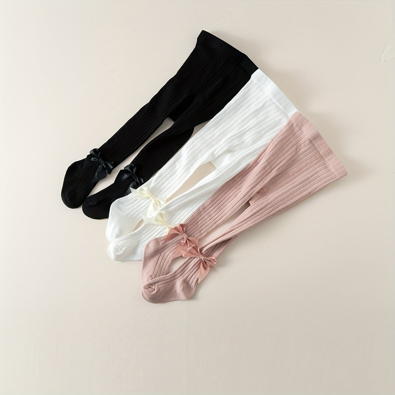 3-pack soft cotton blend bowknot pantyhose for youngsters featuring warm, breathable, and cute striped tights.