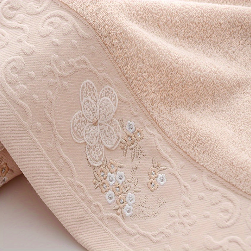 2 Cotton embroidered hand towels with quick-drying, absorbent material for home bathrooms.