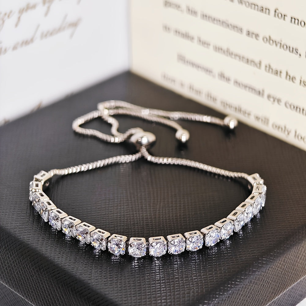 Stylish vintage-inspired cubic zirconia tennis bracelet with adjustable copper chain and sparkling rhinestones, ideal for parties or casual wear, great Valentine's Day gift.