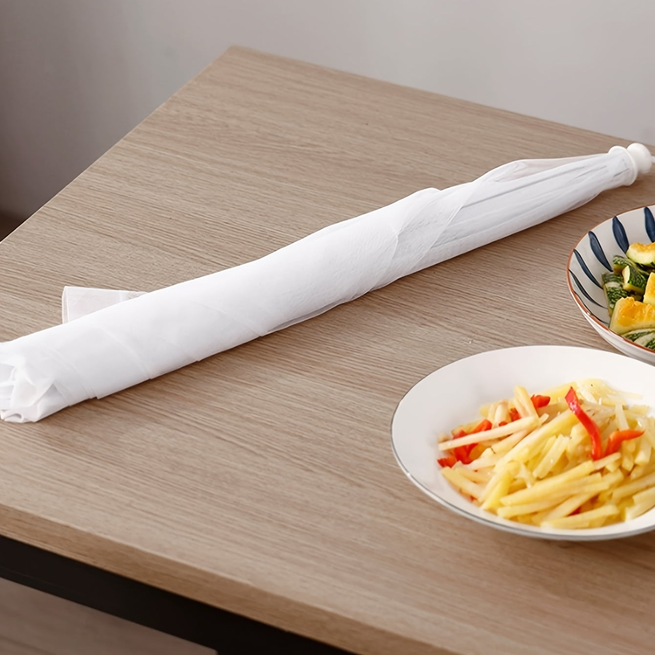 1 white rice cover that doubles as a foldable dining table food cover and household dust cover, suitable for keeping flies away while dining outdoors.