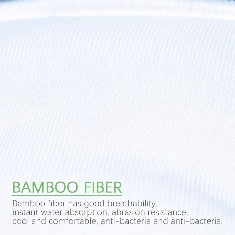 Two pieces of Mumsbest bamboo fiber fabric diaper inserts for baby, reusable liners for nappies.