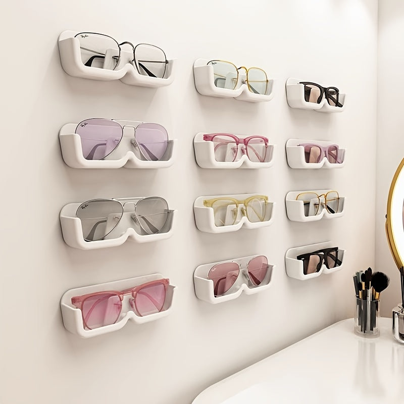 A convenient wall-mounted storage box for glasses, suitable for various locations such as bathrooms and bedside tables, ideal for displaying eyewear.