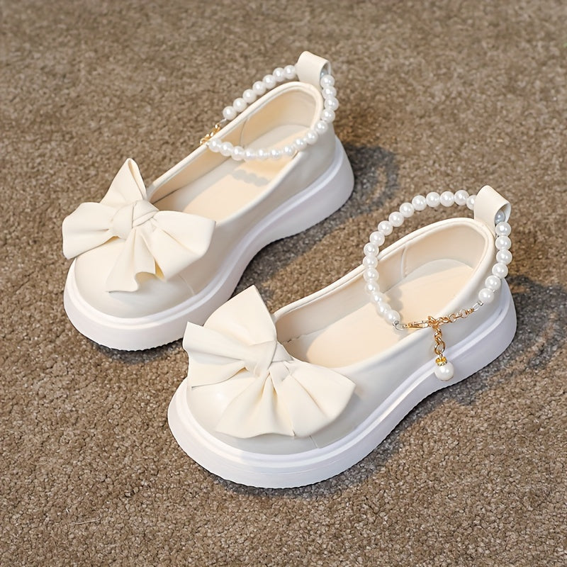 Stylish Mary Jane flats for girls feature pearl and bow accents, perfect for parties and casual wear in spring and fall.