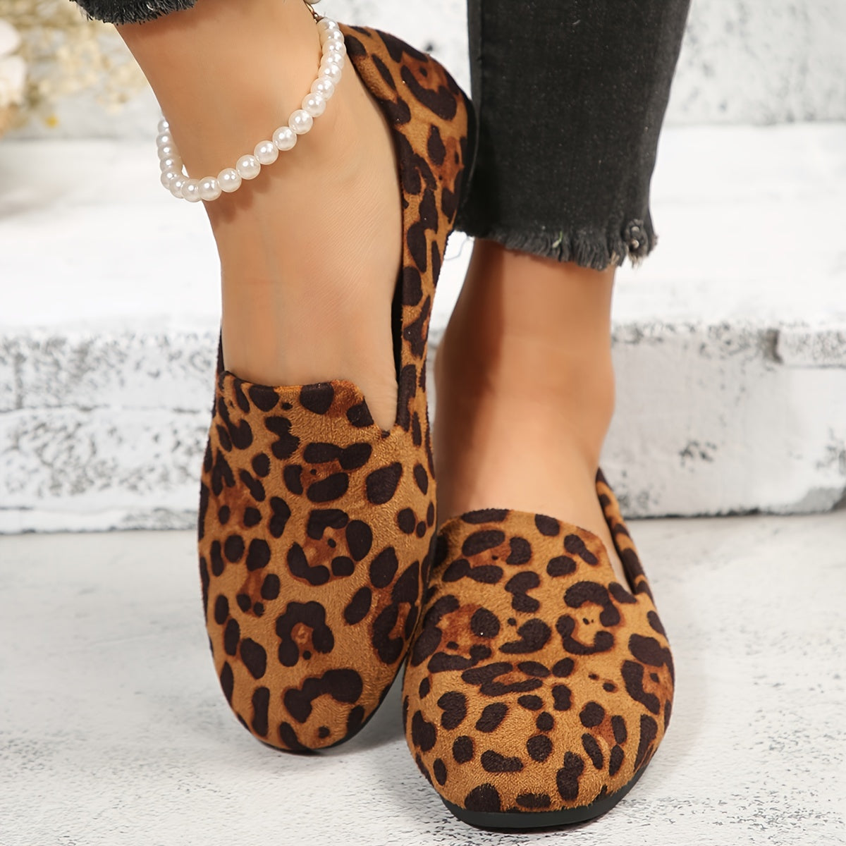 Leopard print women's flats with lightweight slip-on design, plain toe, fabric upper, and plastic sole - perfect for all seasons and versatile boat-style footwear.