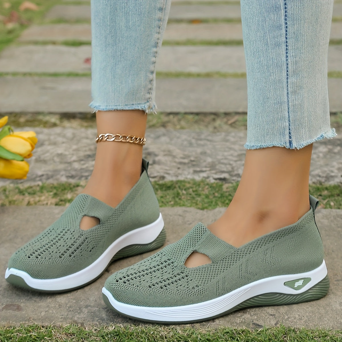 Women's lightweight slip-on running sneakers with breathable fabric and rubber sole for year-round comfort.