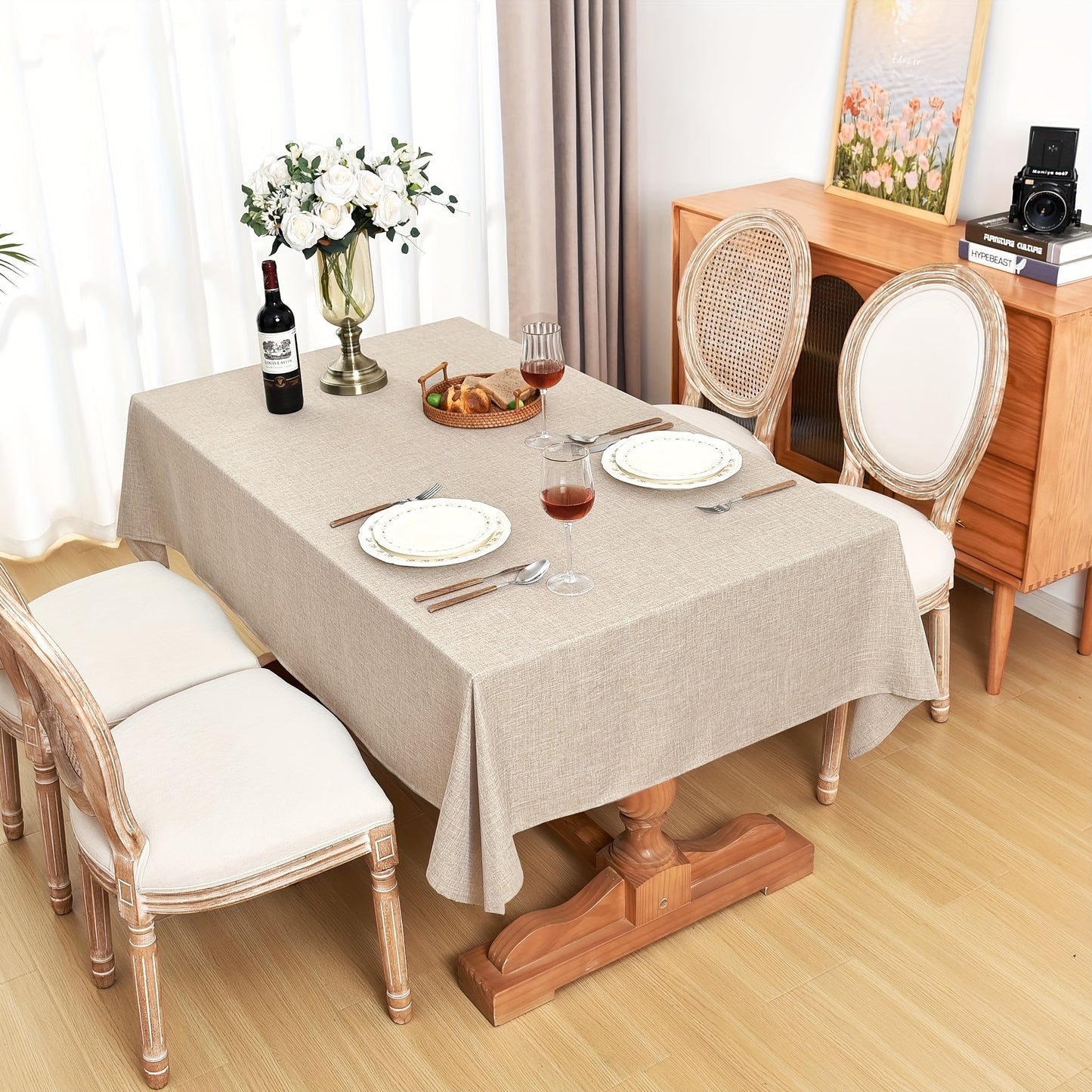 Beige waterproof polyester tablecloth for various occasions, including picnics, holidays, camping, weddings, birthdays, parties, and restaurant buffets, as well as for home kitchen and dining table decor.