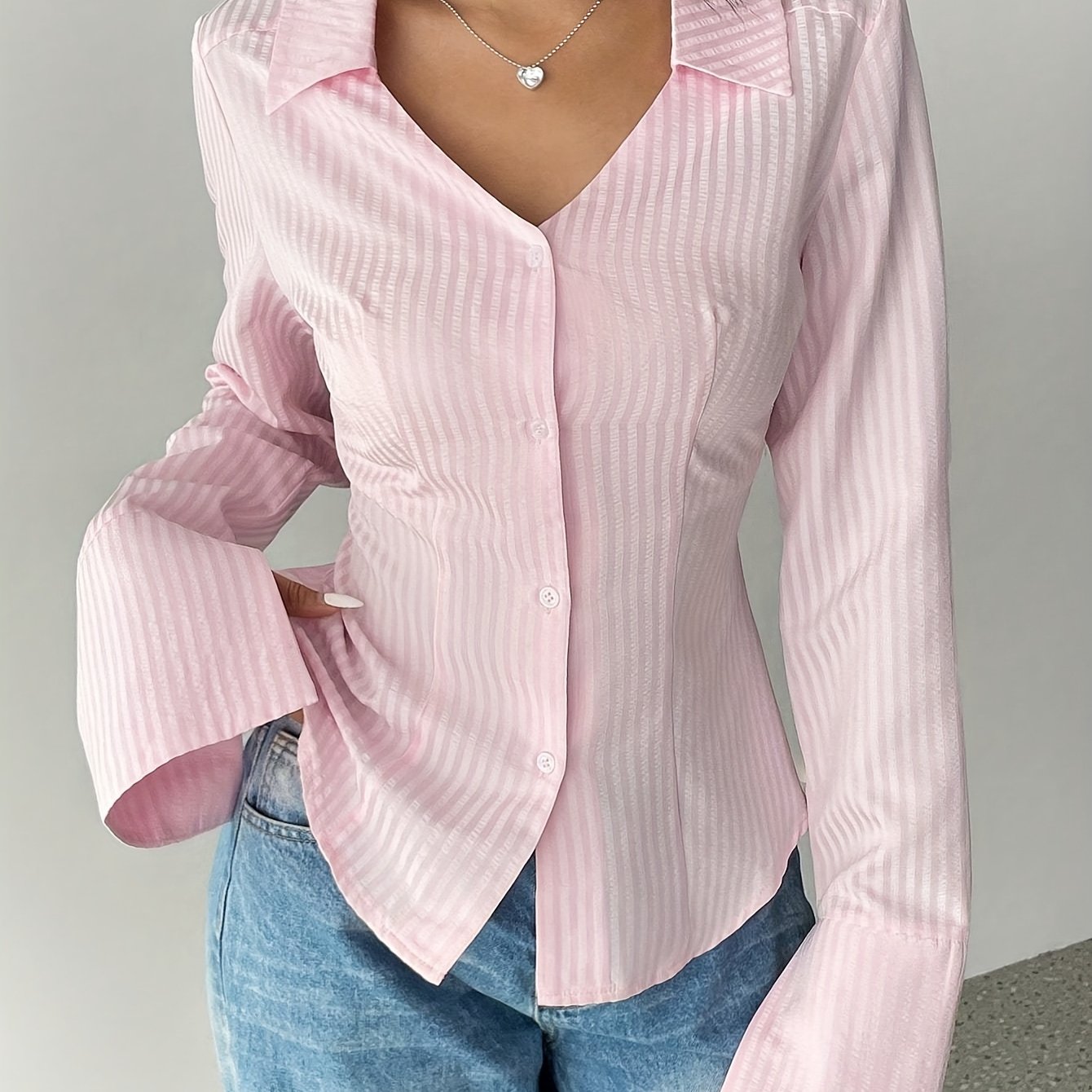 Women's V-neck striped button-up shirt with long sleeves made of woven polyester for spring/fall.