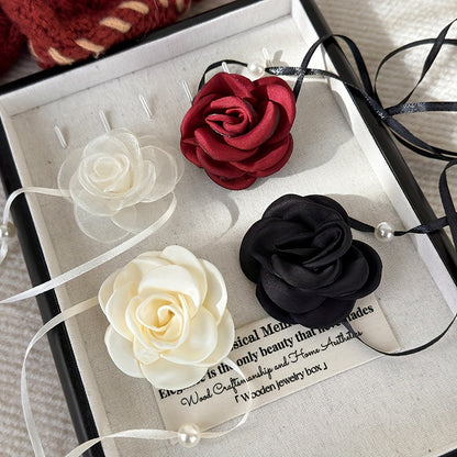 Set of 4 vintage rose flower choker necklaces made of polyester fabric for women.