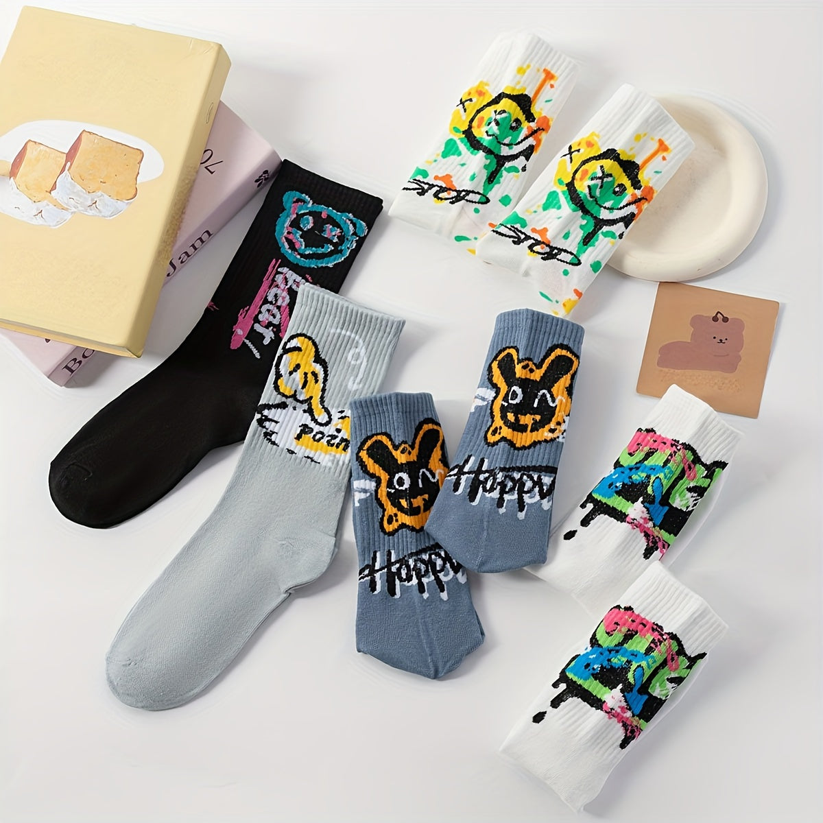 10 Pairs Men's Mid-Calf Socks - Stylish graffiti design, perfect for daily wear and outdoor activities. Made of a blend of polyester and spandex.