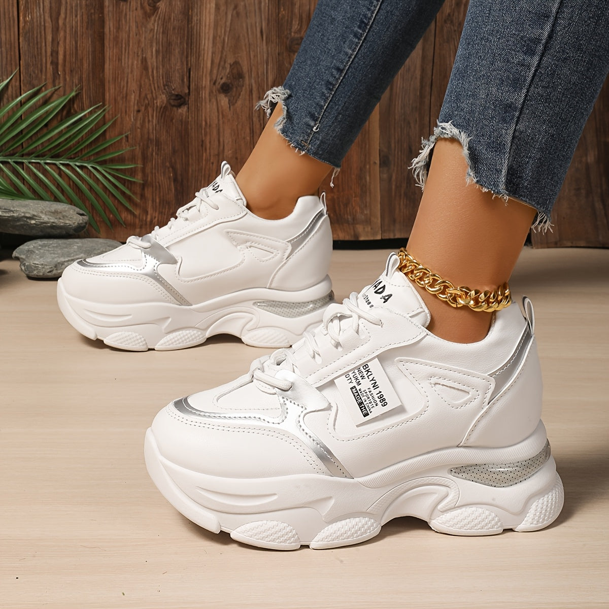 Chunky sneakers for women featuring a casual lace-up design and trendy wedge sports shoes.