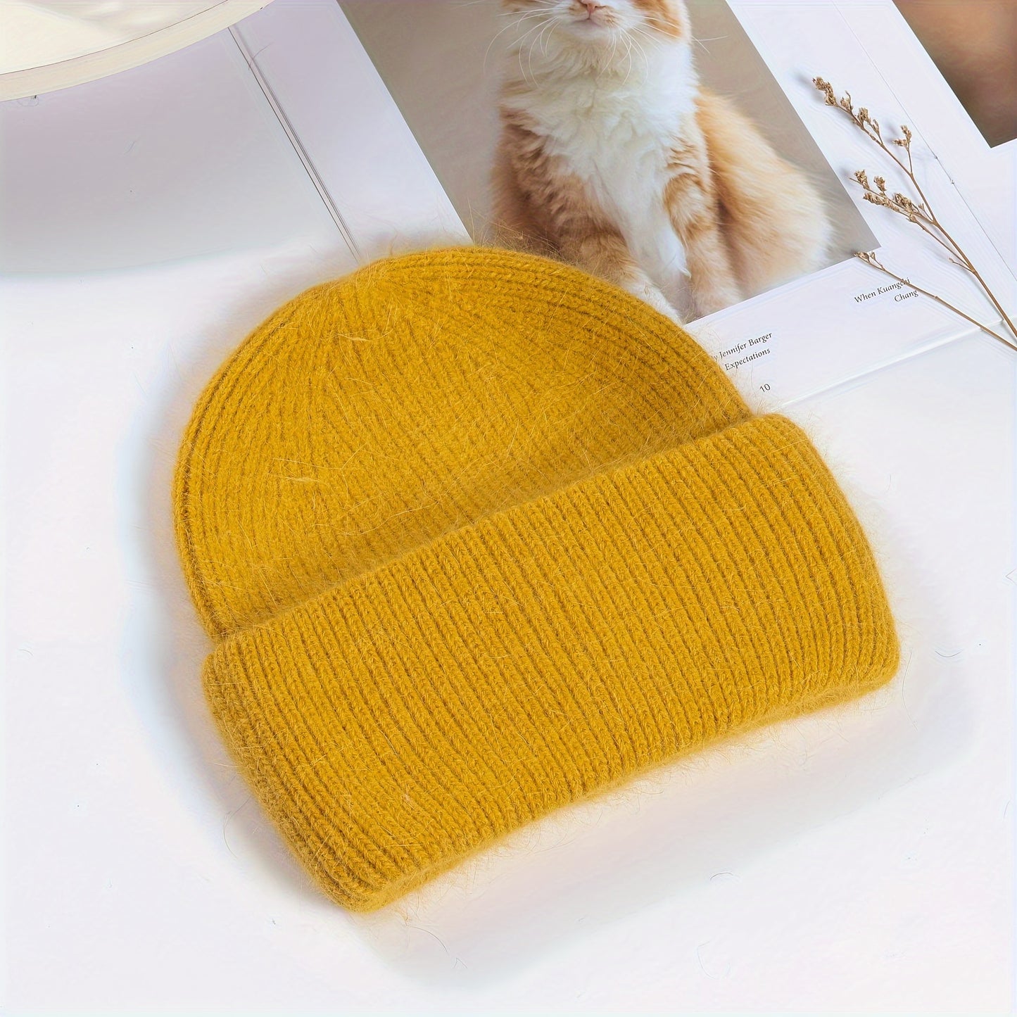 Soft knit beanie in candy colors for women, perfect for casual wear in autumn and winter.