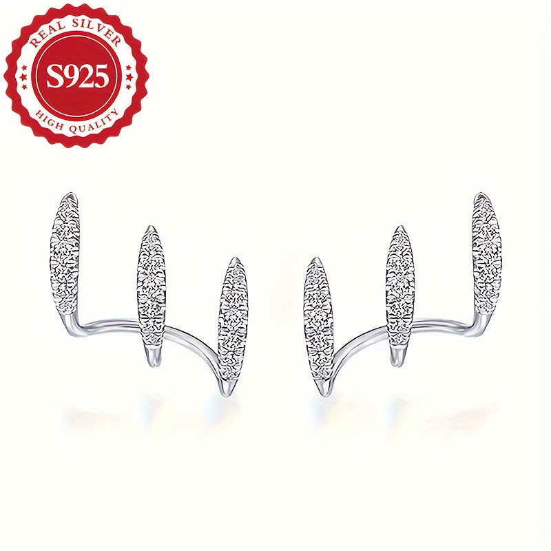 A set of exquisite S925 Sterling Silver earrings with claw-set Zirconia studs - dazzling, hypoallergenic, suitable for all occasions, great as a gift, unique design, perfect for the holiday season.