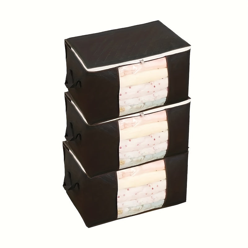 Three 90L storage bags with reinforced handles for organizing clothing, blankets, toys, and bedding in a bedroom wardrobe.