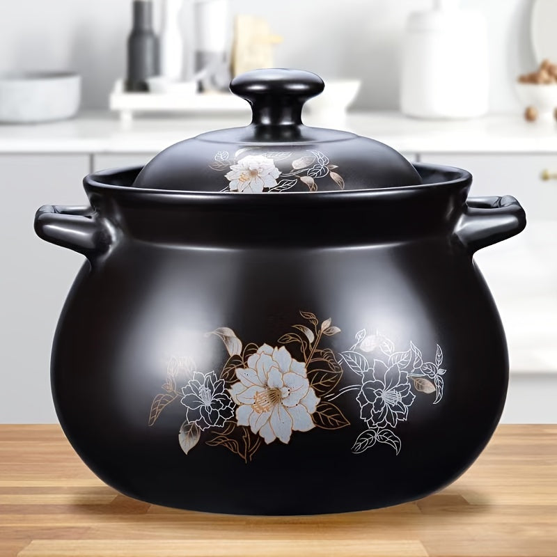 Black ceramic pot with dual handles, holding up to 71oz - suitable for high and low temperatures. Designed for 2-3 people, perfect for home kitchens.