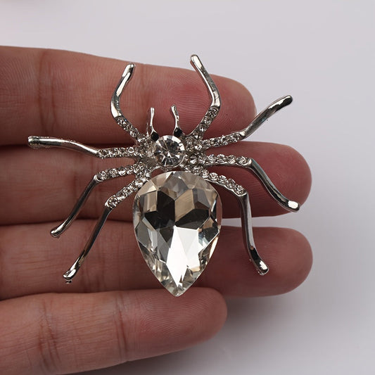 Fashionable clothing wholesale item: Vintage spider brooch pin featuring a large rhinestone crystal and unique irregular shape.