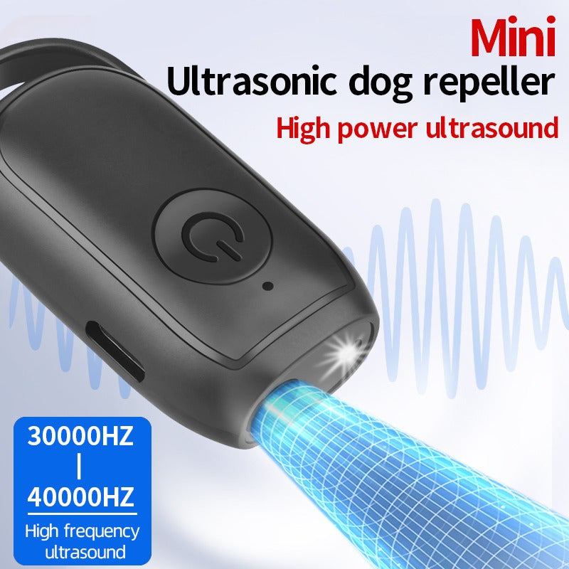 Mini Ultrasonic Dog Repeller with LED light and battery to scare dogs and stop barking.