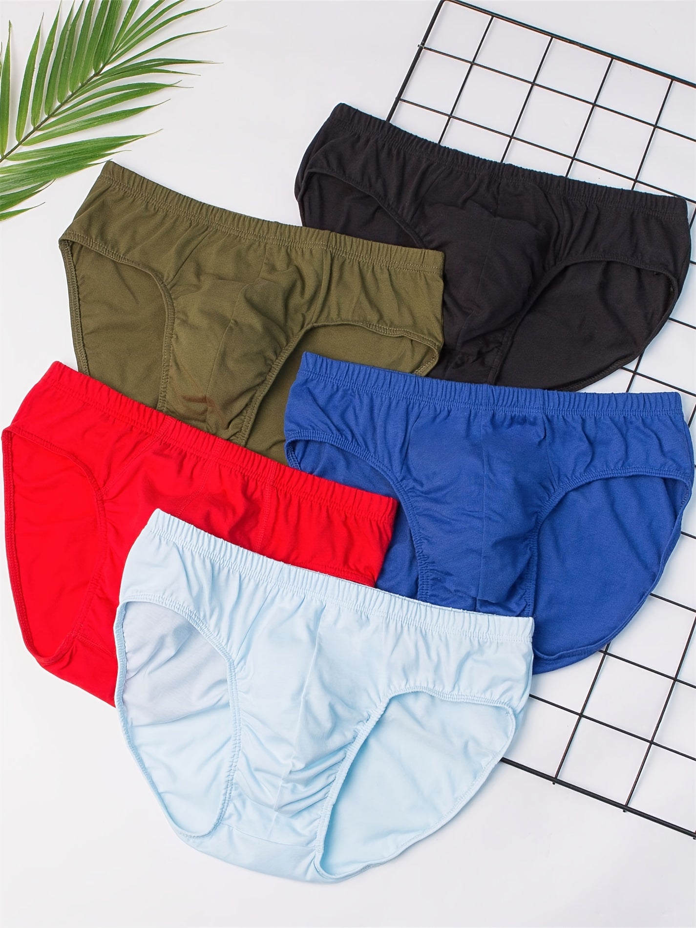 10 Men's cotton boxer briefs with solid color, breathable mid-rise comfort fit, made of 100% cotton knit fabric with medium stretch.