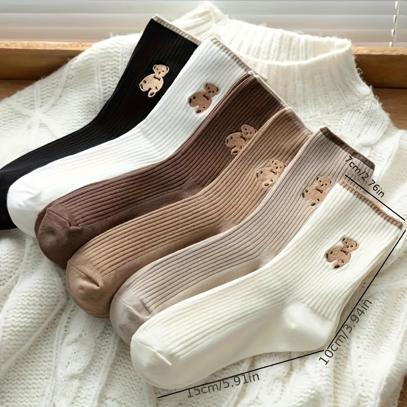 5 pairs of cute cartoon bear embroidered crew socks for women made from soft, breathable polyester knit with spandex. Hand wash recommended. Ideal for casual or sports wear.