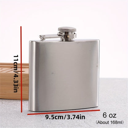 Portable stainless steel hip flask for alcohol, with screw cap and pocket-sized design for outdoor use.