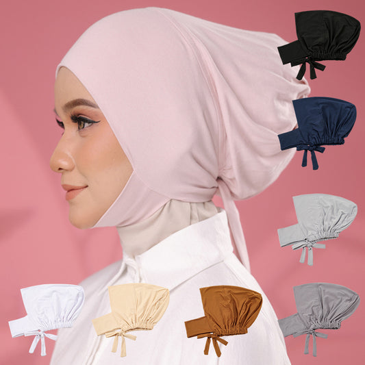 Adjustable women's instant hijab with undercap, solid color, machine washable, perfect for Eid and casual or religious wear. Made of polyester with flowing design.