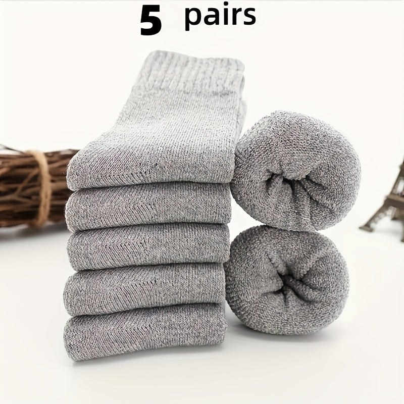 5 pairs of men's thick wool blend mid-calf winter socks in solid colors, soft and warm for casual or cold weather. Gift-ready packaging, quality fabric.