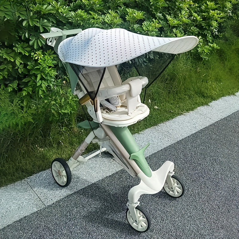 Detachable stroller sunshade shields from wind and UV rays.