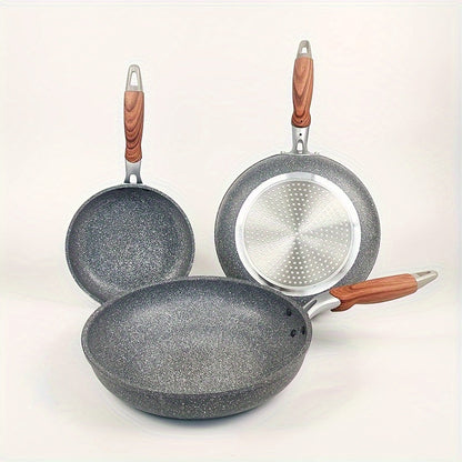 Set of 3 multi-sized frying pans made of cornstone material. Features a flat bottom design, non-stick coating, rust-resistant, easy to clean, compatible with induction cookers and gas stoves. Complete with anti-scald handles for safe cooking.