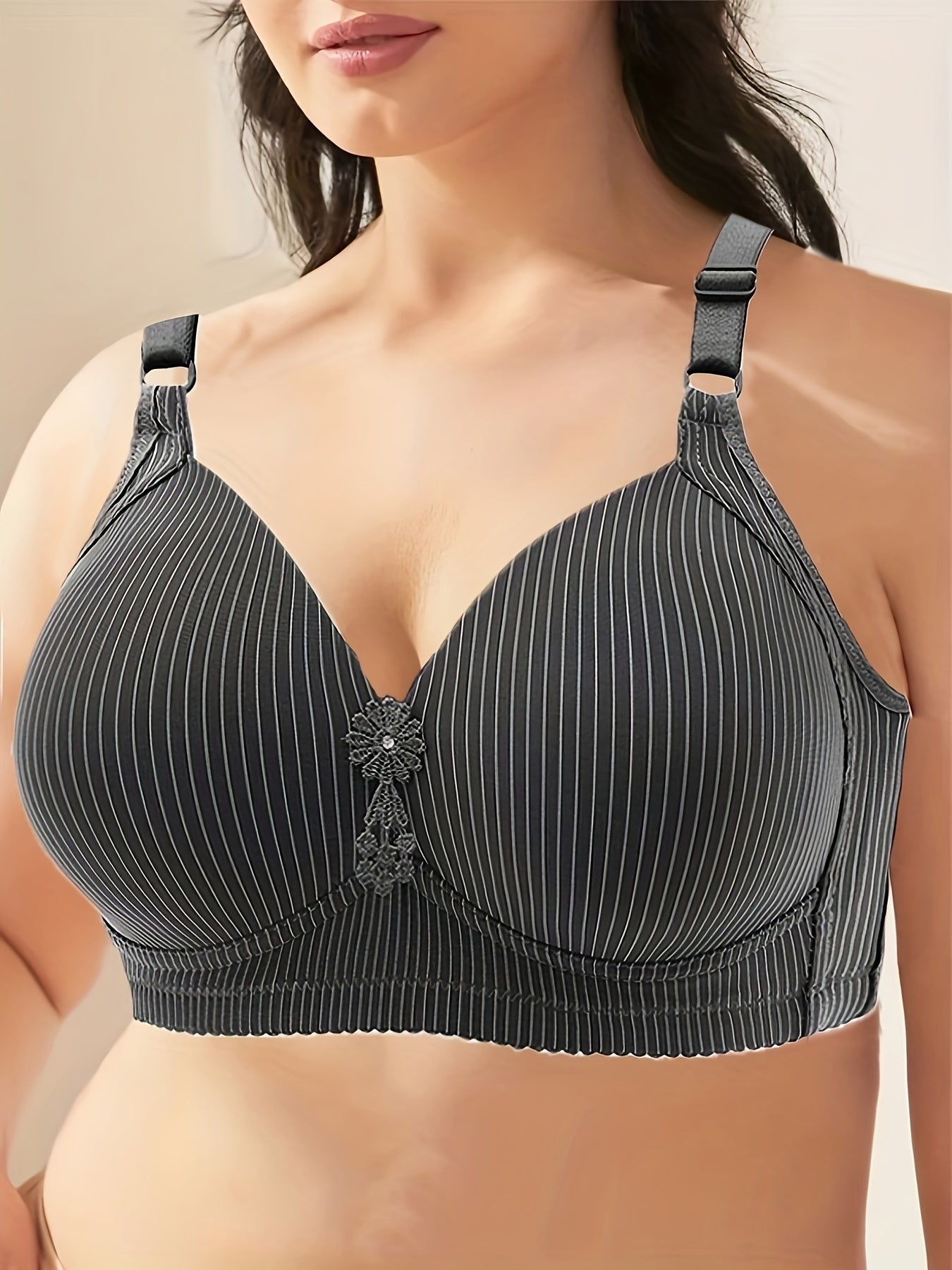 Elegant plus size striped seamless push up bra for women with medium support and non-removable padding. Made of 90% polyester and 10% elastane. Suitable for all seasons.