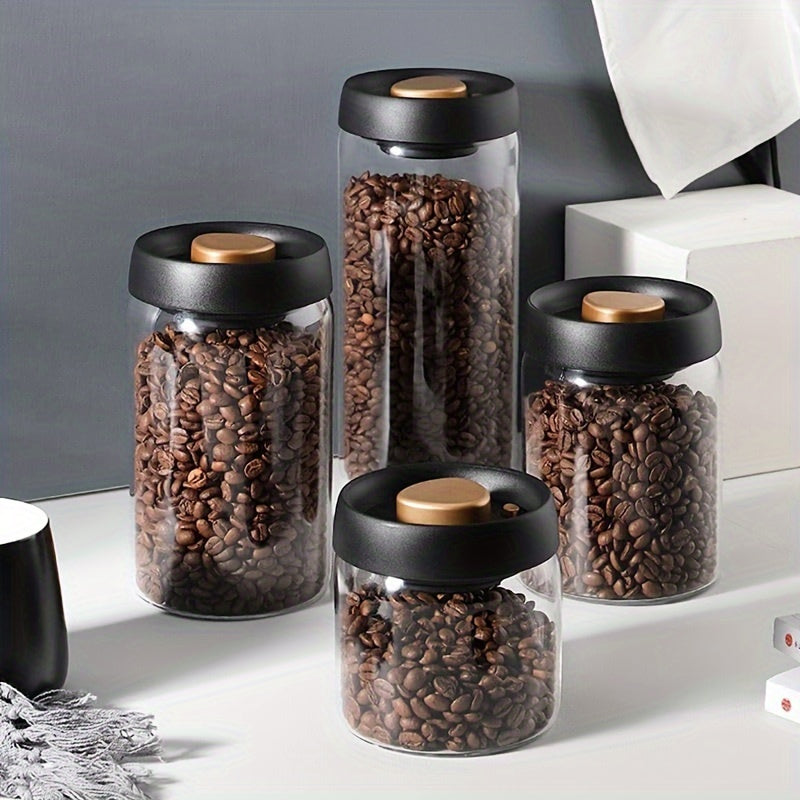 Single piece storage container for coffee beans, tea, nuts, and grains. This vacuum-sealed glass tank features a pressure pump for freshness preservation and a moisture-proof design. Perfect for kitchen organization and storage, it is a versatile