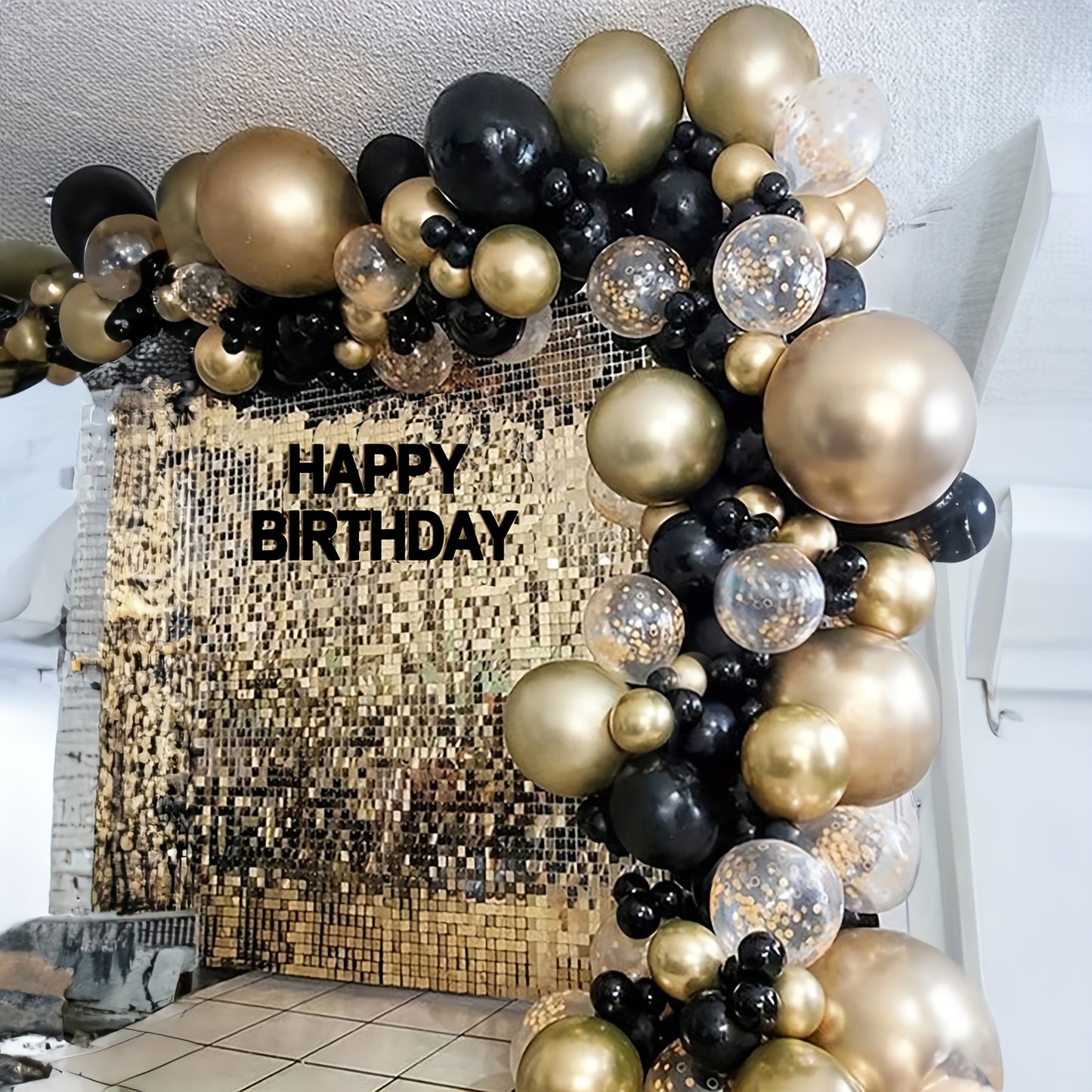 131-piece Black and Gold Balloon Garland Arch Kit including metallic gold and black latex confetti balloons in various sizes for parties and celebrations.