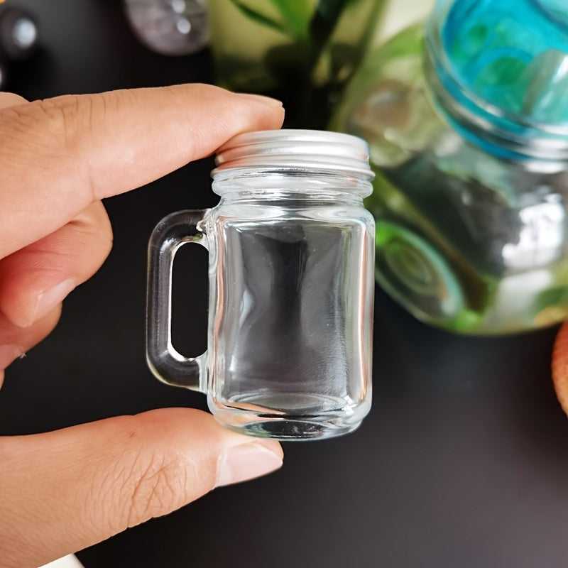 Set of 6 mini mason jar shot glasses with handles, made of clear glass and holding 40ml. Perfect for serving coffee or milk, with caps for portability. Great for parties and home use.